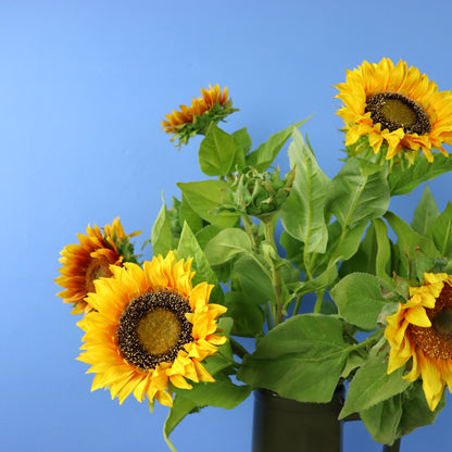 Kunstboeket Balou in donkergroene Return to Sender kanvaas met oor, maat XL – Reflower, abonnement op kunstbloemen