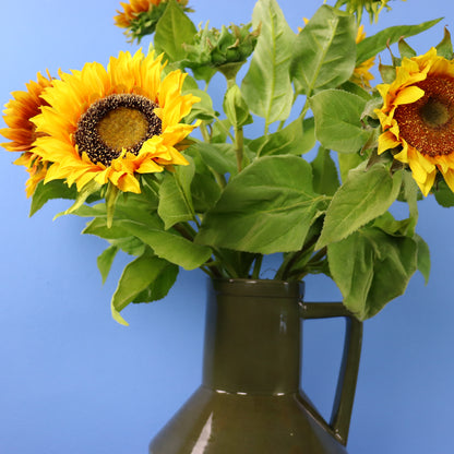 Kunstboeket Balou in donkergroene Return to Sender kanvaas met oor, maat XL – Reflower, abonnement op kunstbloemen