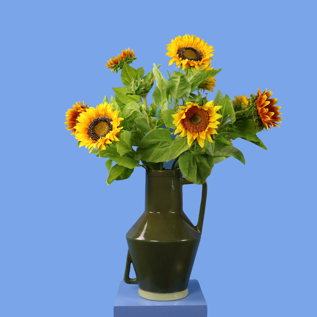 Kunstboeket Balou in donkergroene Return to Sender kanvaas met oor, maat XL – Reflower, abonnement op kunstbloemen